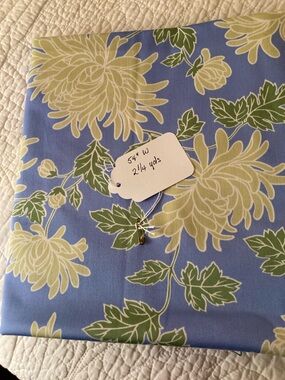 Blue Floral Fabric with Cream Flowers and Green Leaves